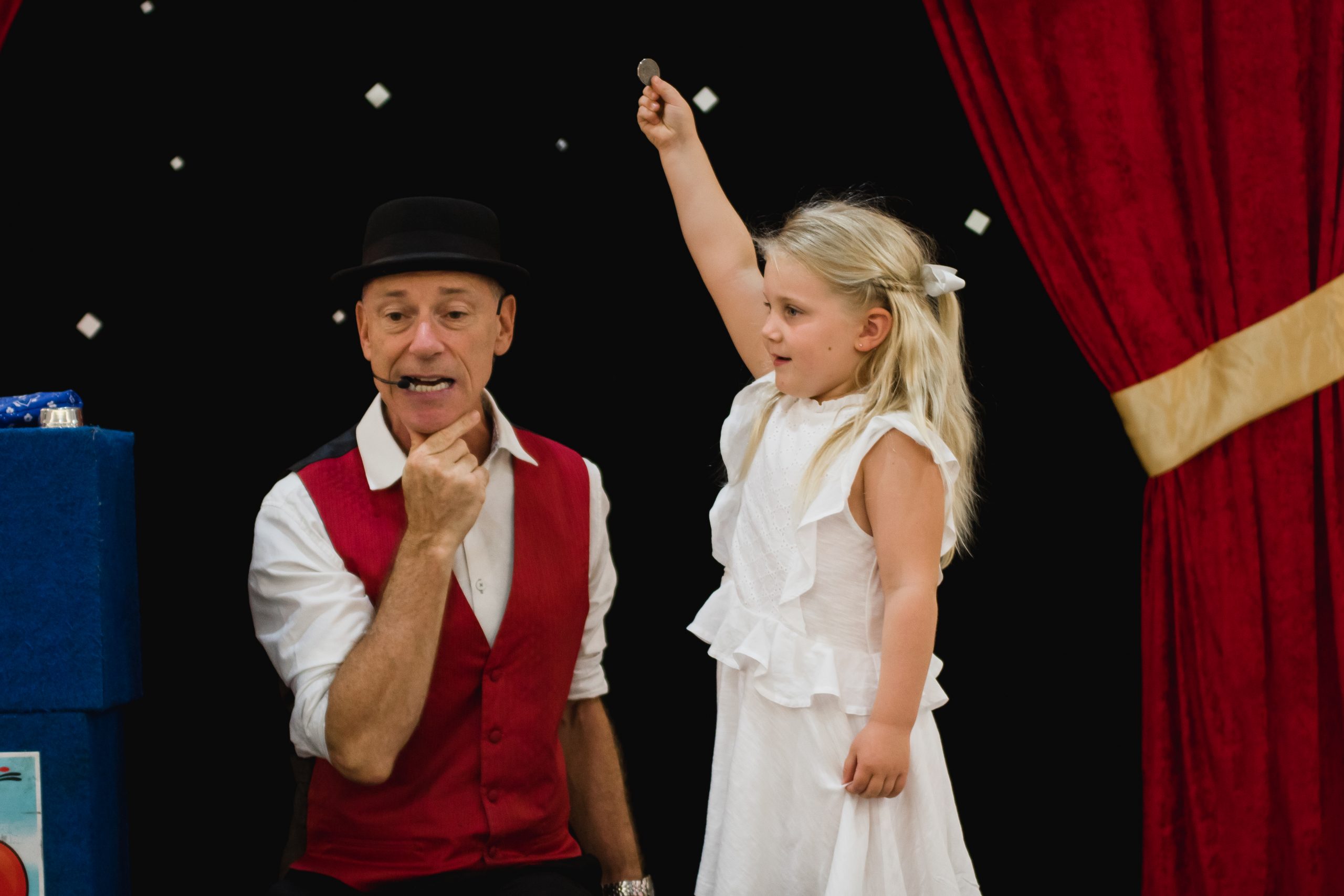 Magic Glen performing an interactive magic trick with a child