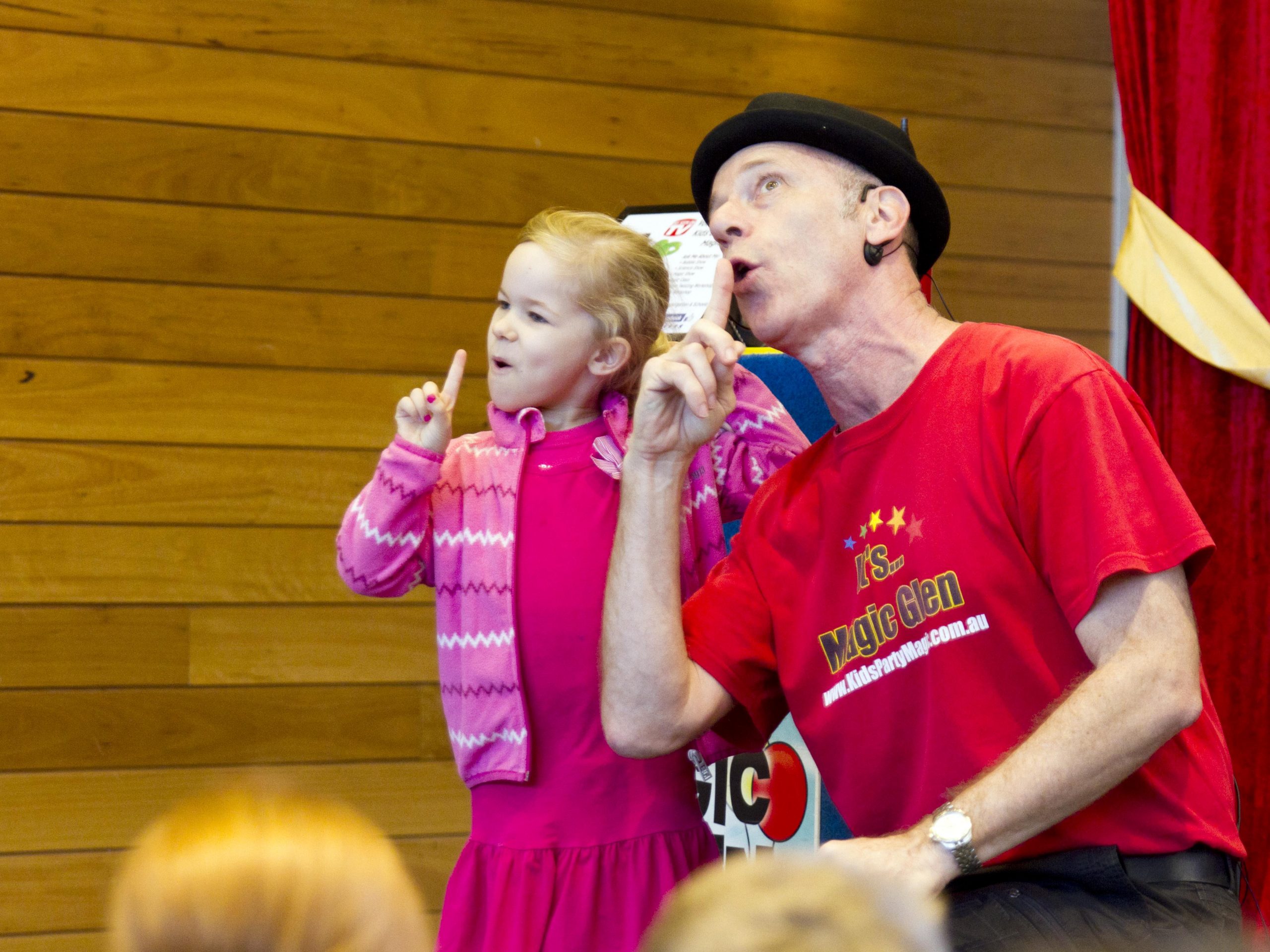Magic Glen performing an interactive magic trick with a child