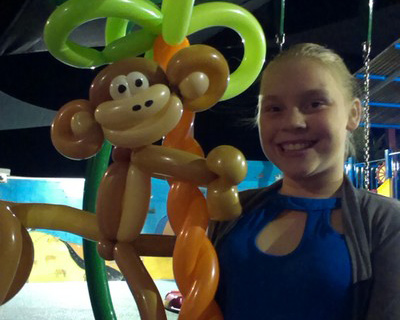 Balloon monkey in a tree